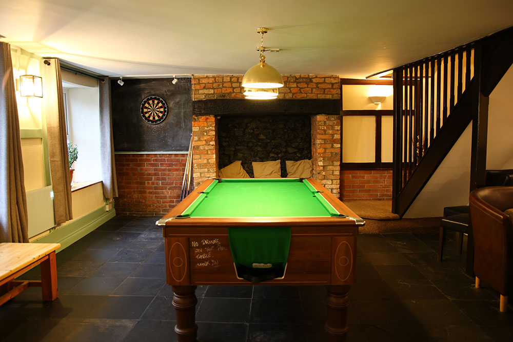 Games room pool table and darts